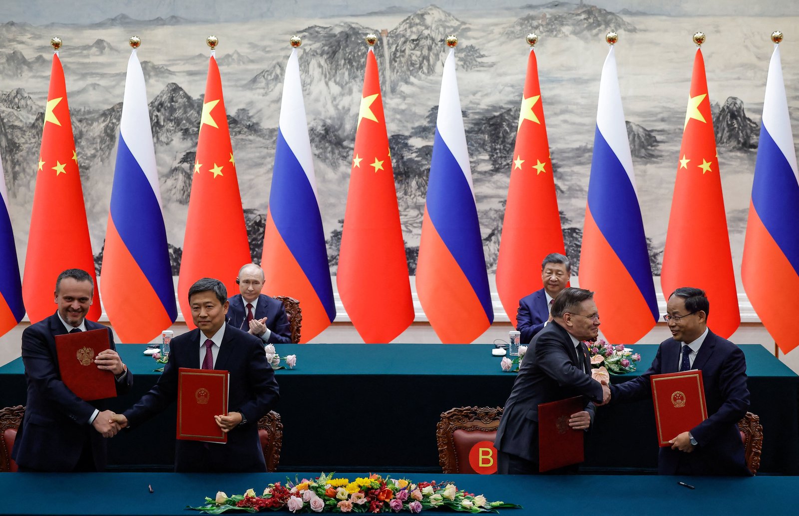 China, Russia offer veiled US critique during Putin visit