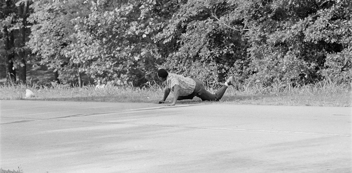 Conspiracy theories that emerged from a civil rights shooting 60 years ago resonate today