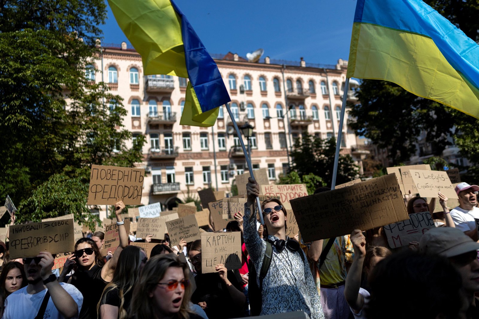 Protests after Ukraine dismisses popular defense minister