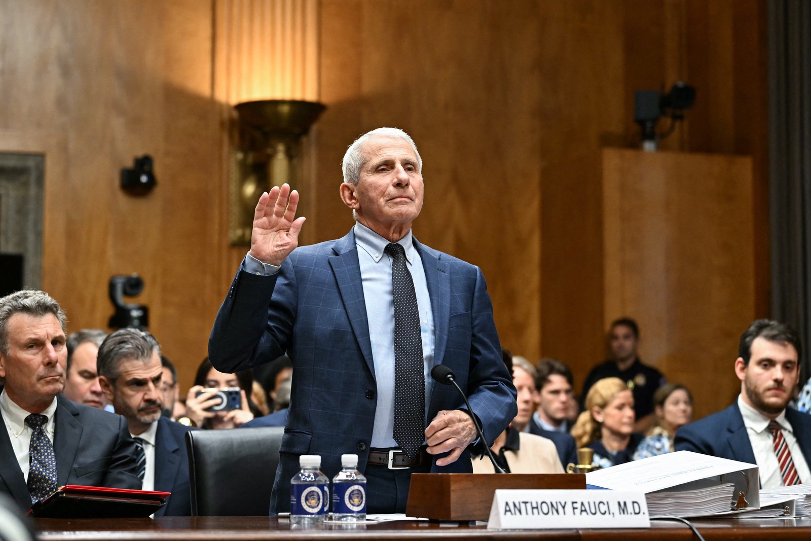 Trump denies munitions shortages, vows to jail leakers; Israeli settler charged with killing Palestinian; Senate holds Fauci in contempt