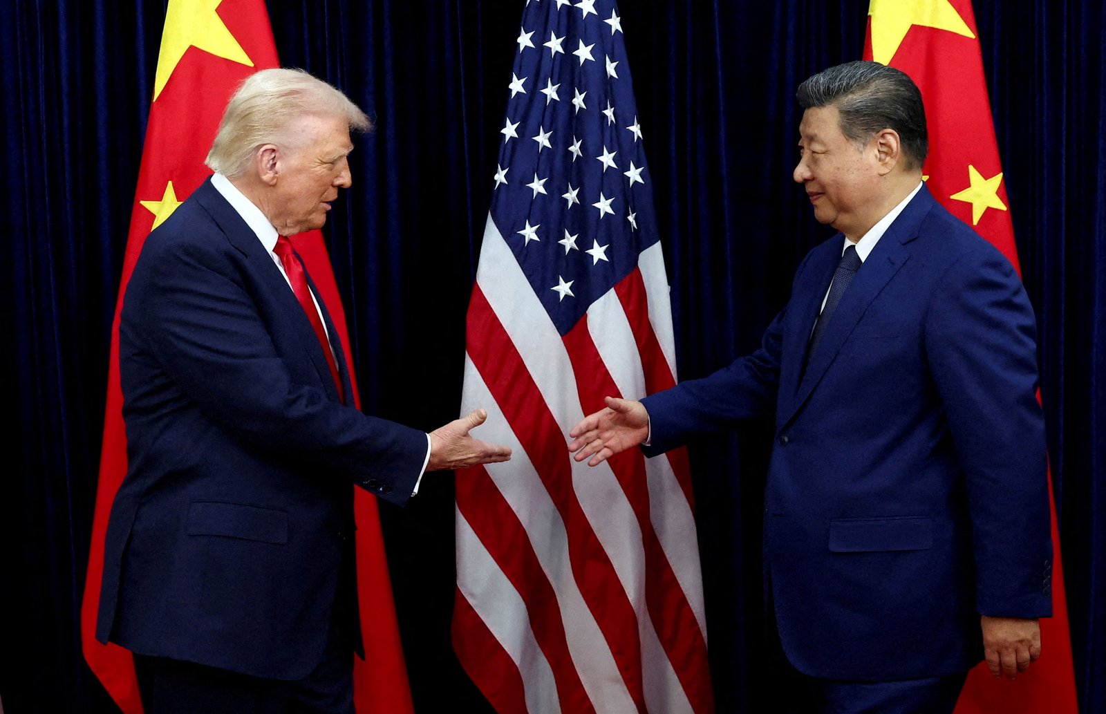 Trump's China ambitions reduced as he meets Xi