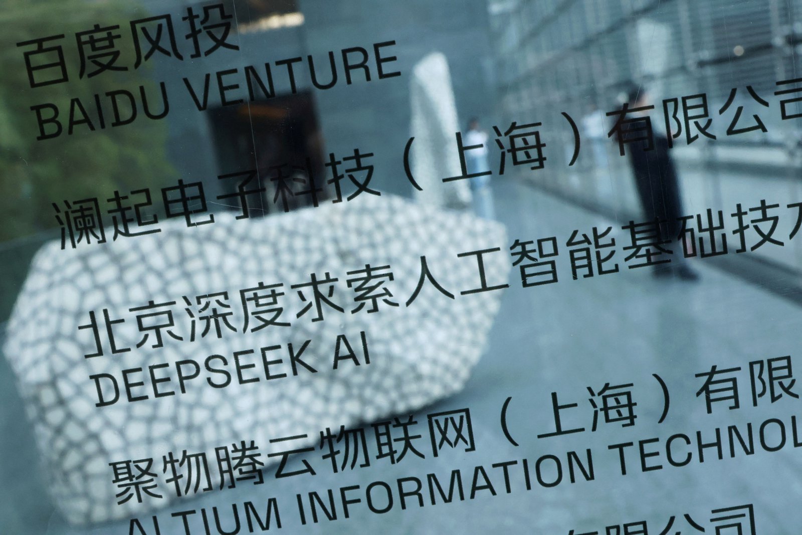 Chinese AI firms scale aggressively to compete with US
