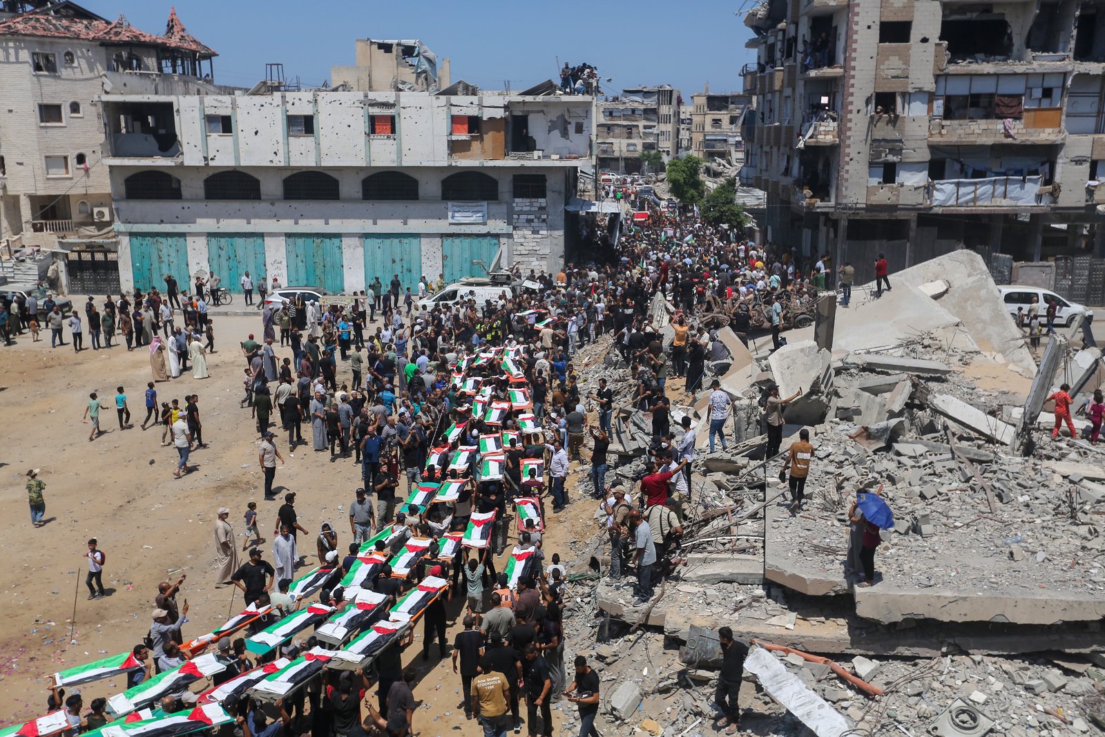 U.S. crowdsources ideas on Iran; Gaza holds mass funeral for 112 killed in 2023; Board of Peace contradicts itself