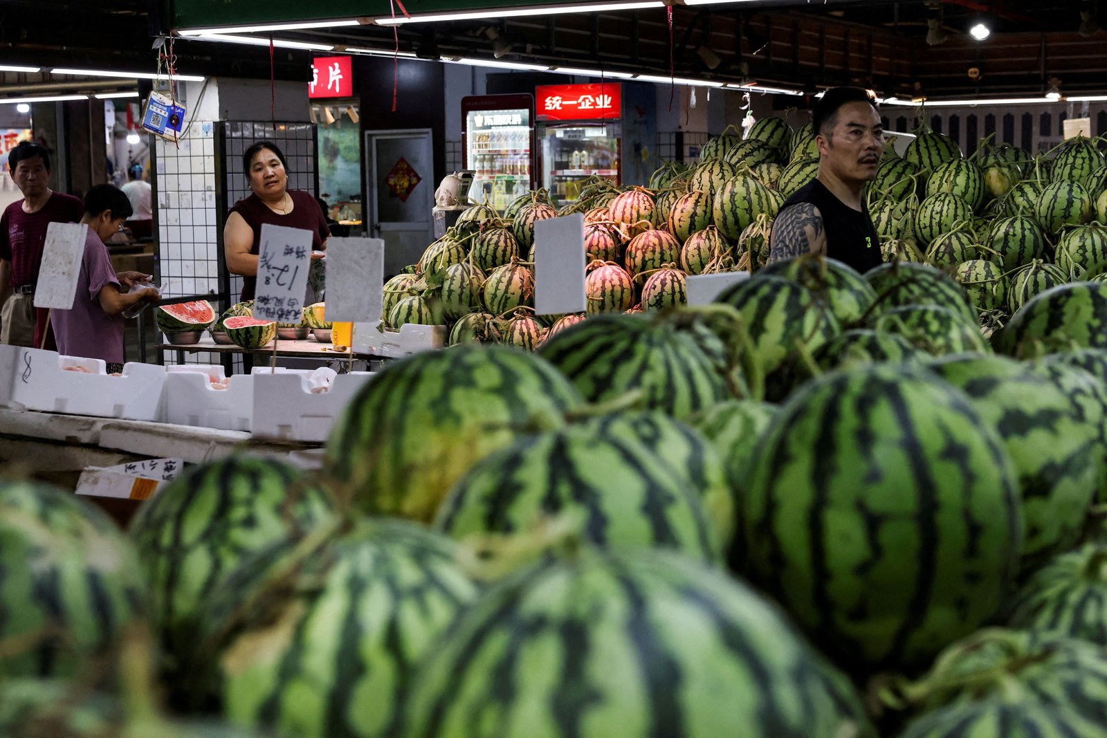 China inflation ticks up but deflationary pressures linger