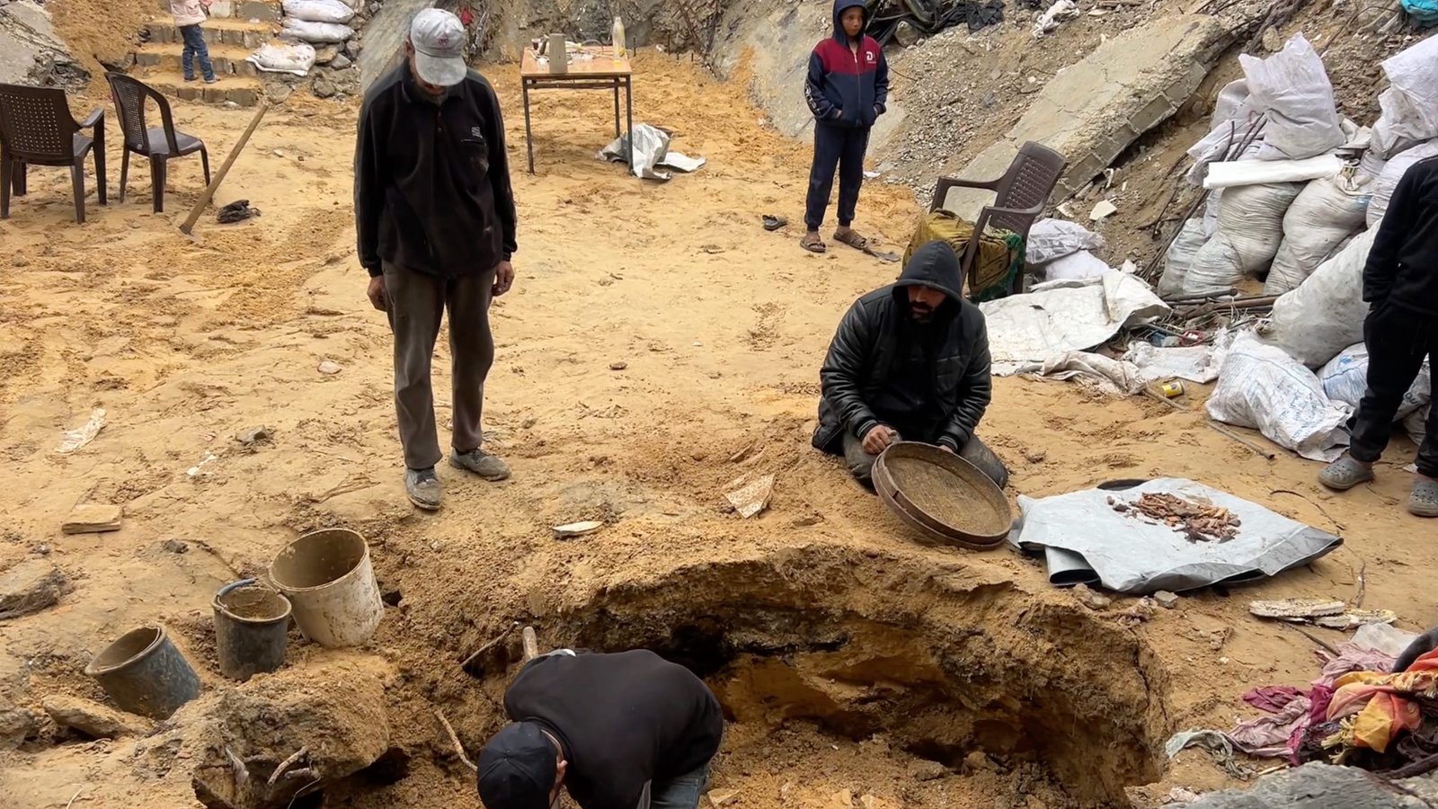 In Gaza, One Man Is Searching for the Remains of His Family With a Flour Sifter