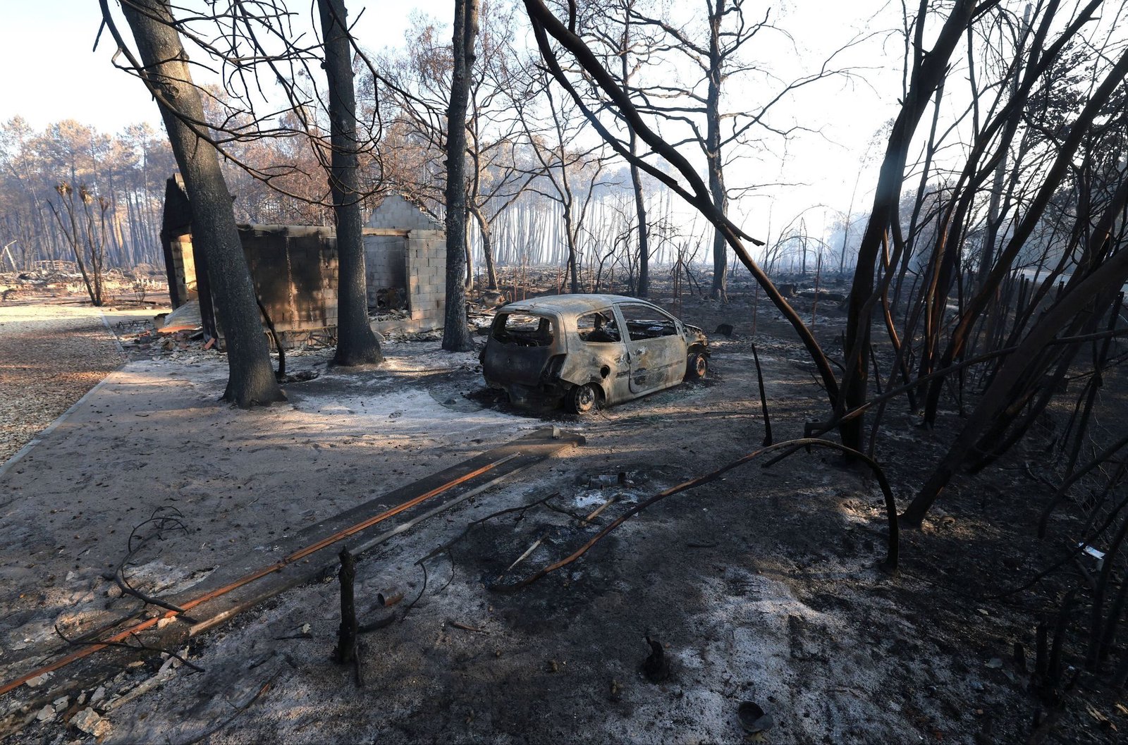 Macron says fires are warlike crisis for France
