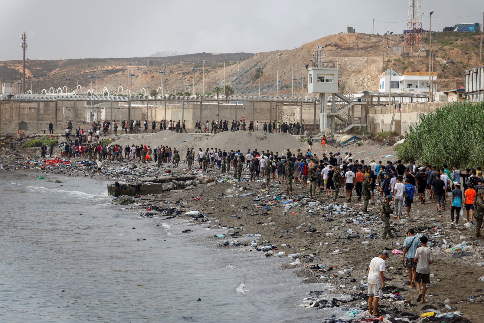 Nearly 50,000 migrants rush Spanish enclave sparking crisis