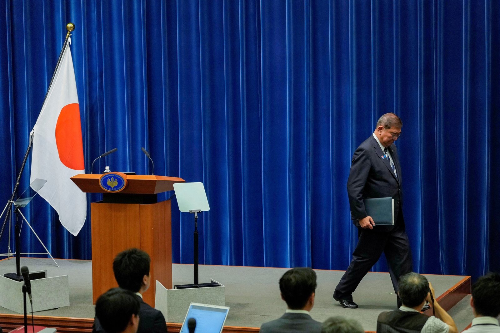 Japanese prime minister resigns, takes fall for disappointing elections