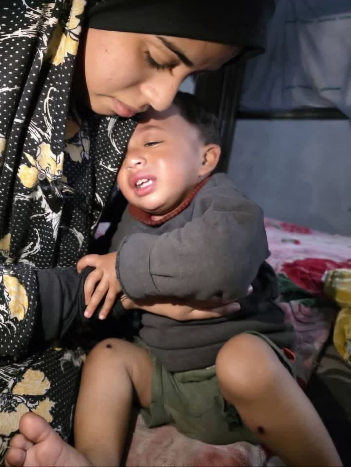 The Man Who Walked Toward the "Yellow Line" in Gaza—and the Son He Carried With Him