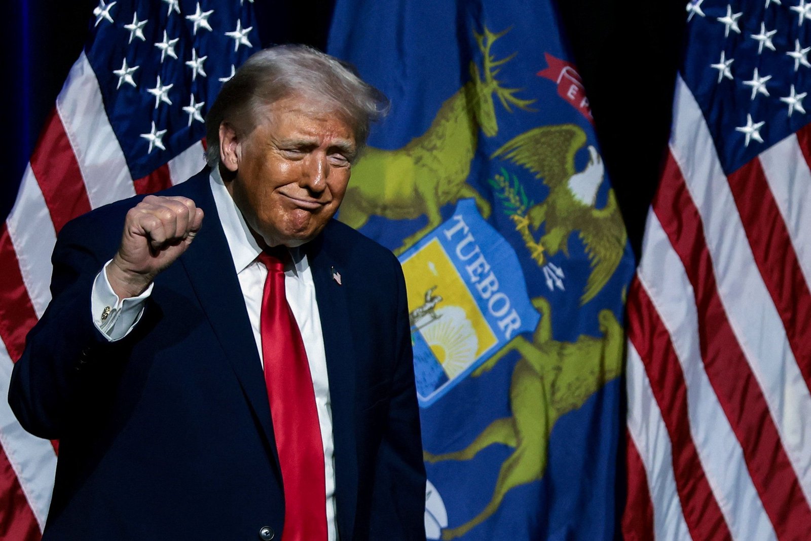 Trump stops in Michigan swing district