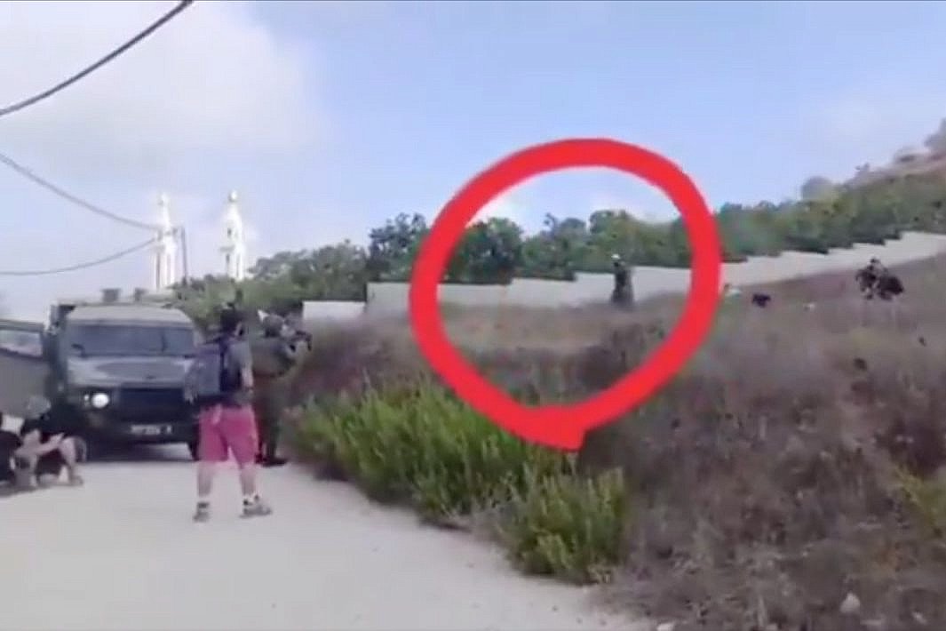 Palestinian who snatched settler’s weapon was killed while unarmed, videos show
